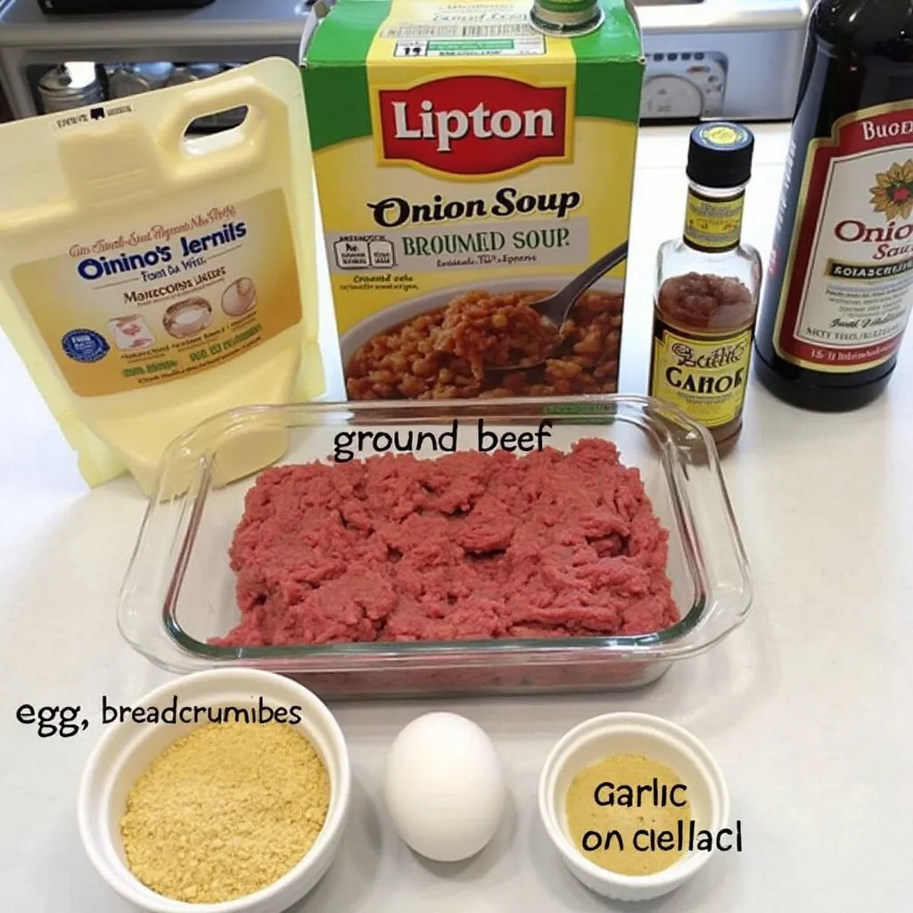 Lipton Onion Soup Meatloaf sliced and served on a plate with mashed potatoes and vegetables